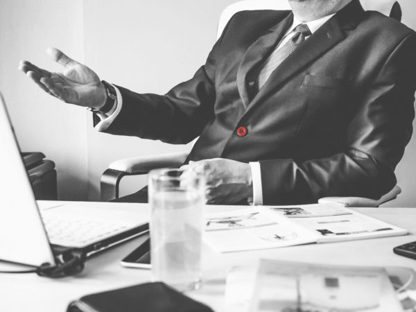 Business man sitting at table