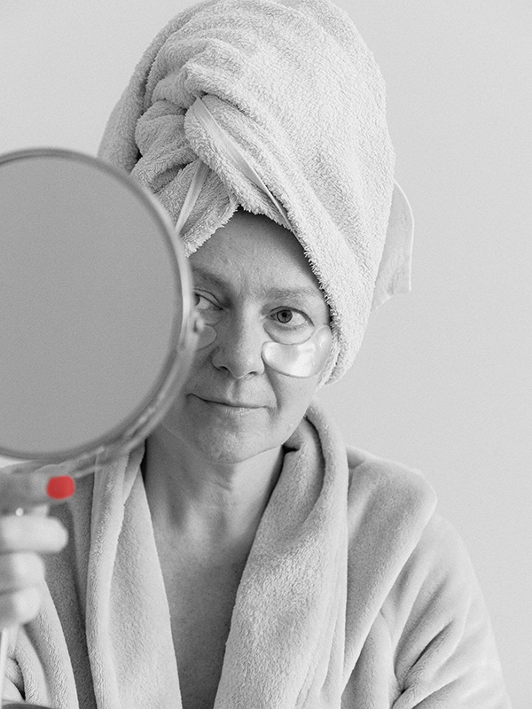 Woman looking in the mirror